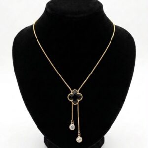 Collier pendentif trèfle noir et zircons dorés